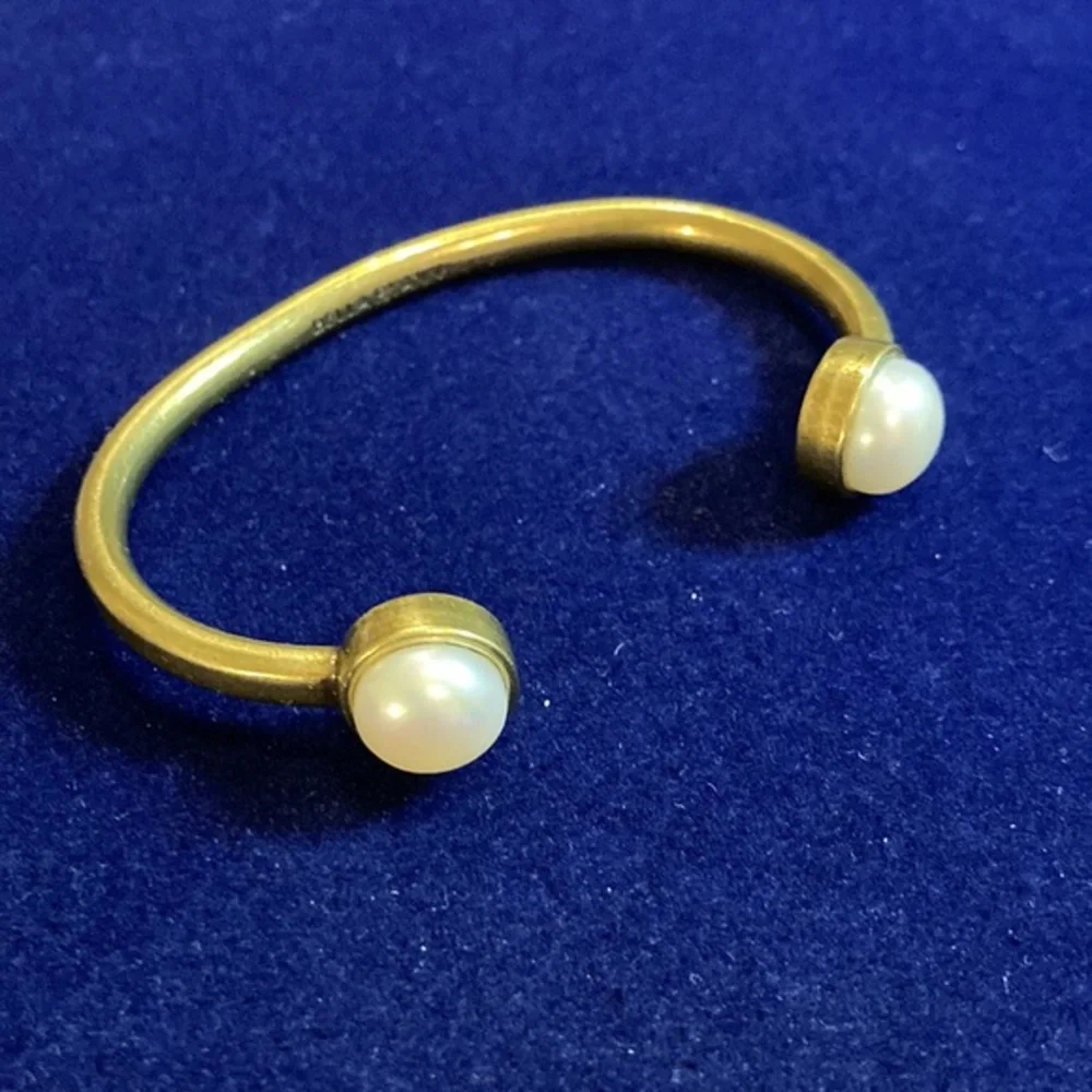 Bella Ryann brass bangle bracelet with faux pearl end caps